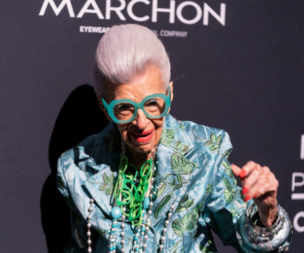 Iris Apfel in blue and green