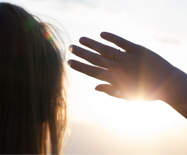 Girl blocking light