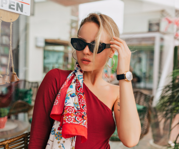 Woman in red acetate sunglasses